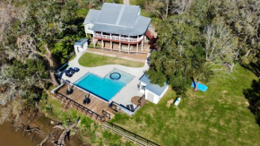 The San Bernard River waterfront provides private access to a spa, boat ramp, and jet skiing